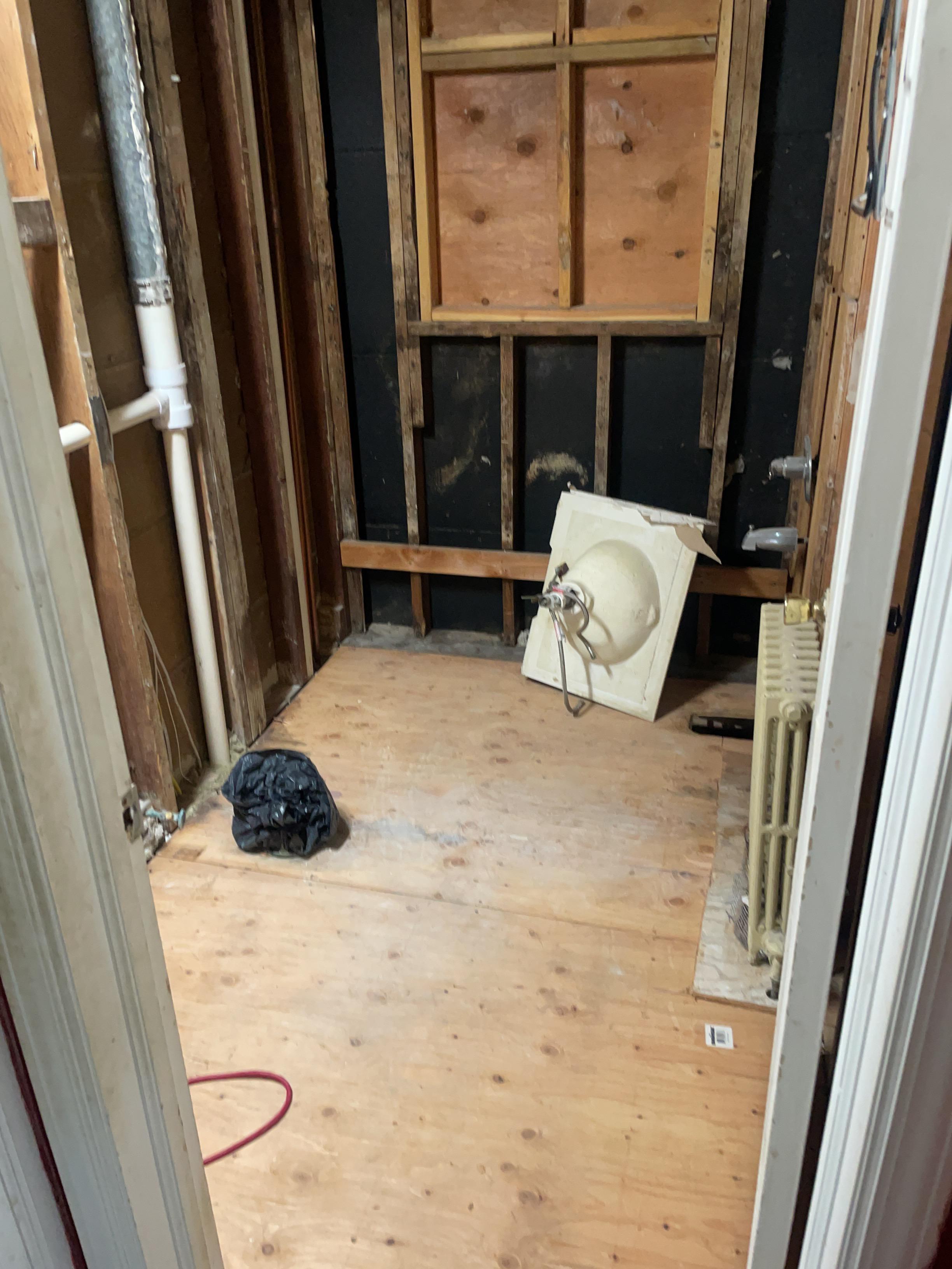 Affected material removed from first floor bath