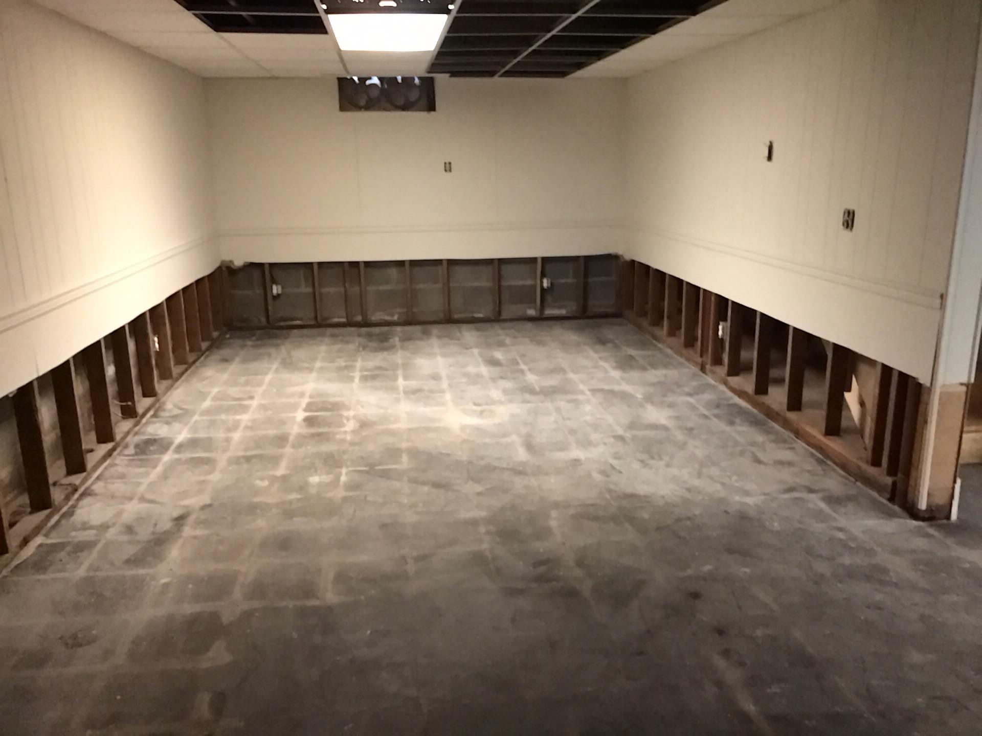 Water damaged material removed from basement