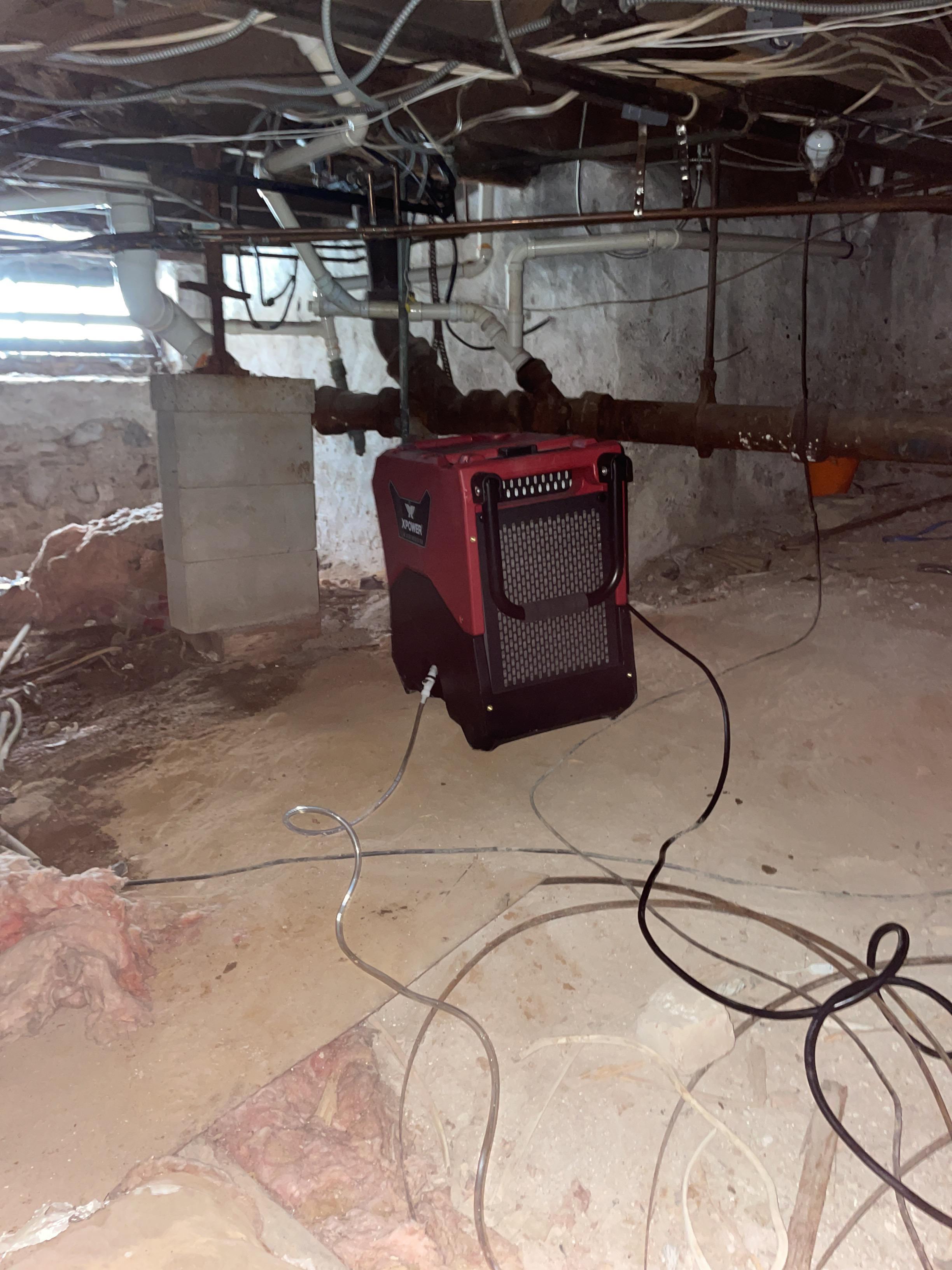 Dehumidifier in crawl space.